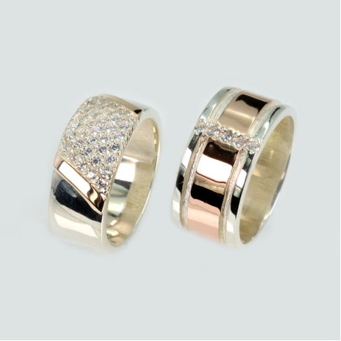 Пара обручальных колец из серебра с золотом