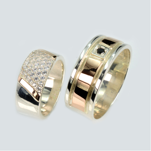 Пара обручальных колец из серебра с золотом