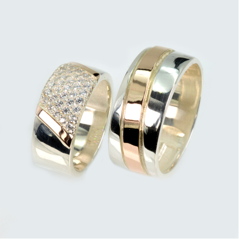 Пара обручальных колец из серебра с золотом