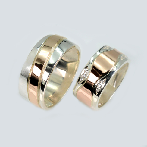 Пара обручальных колец из серебра с золотом