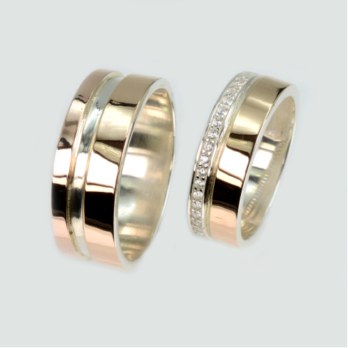 Пара серебряных колец с золотом