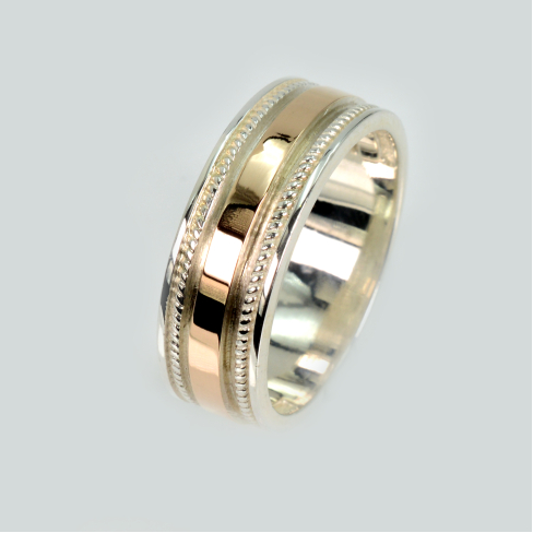 Обручальное кольцо из серебра с золотом