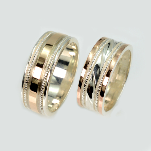 Пара срібних обручок з золотом