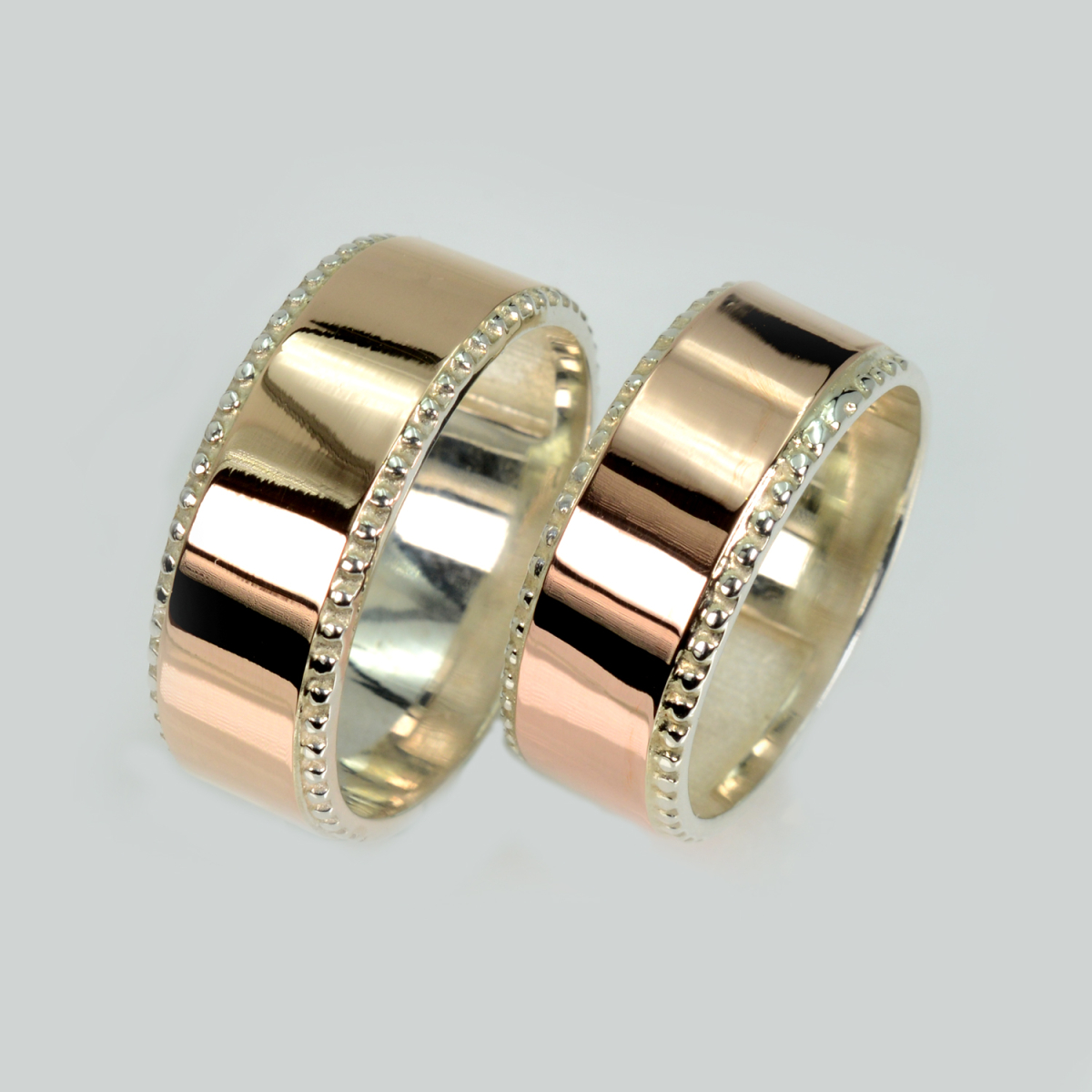 Пара срібних обручок з пластинами золота (Обр24Обр24)