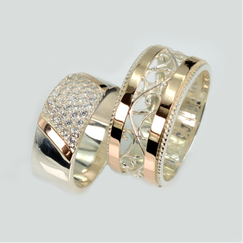 Пара обручальных колец из серебра с золотом