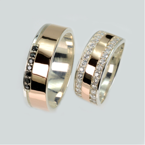 Пара обручальных колец из серебра с золотом