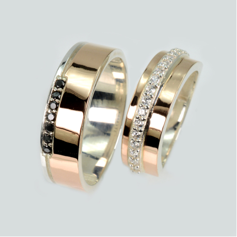 Пара обручальных колец из серебра с золотом