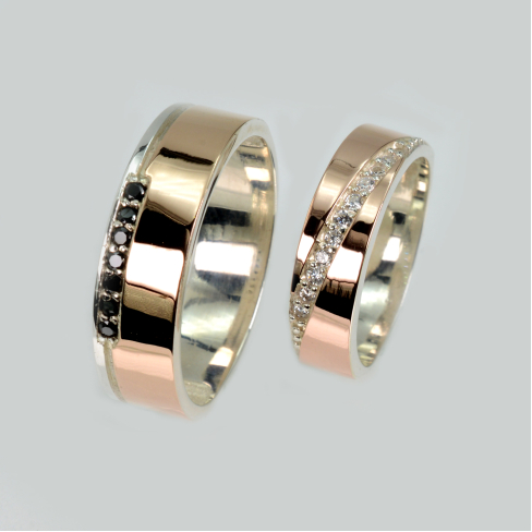 Пара обручальных колец из серебра с золотом