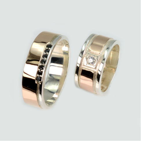 Пара обручальных колец из серебра с золотом