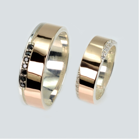 Пара обручальных колец из серебра с золотом