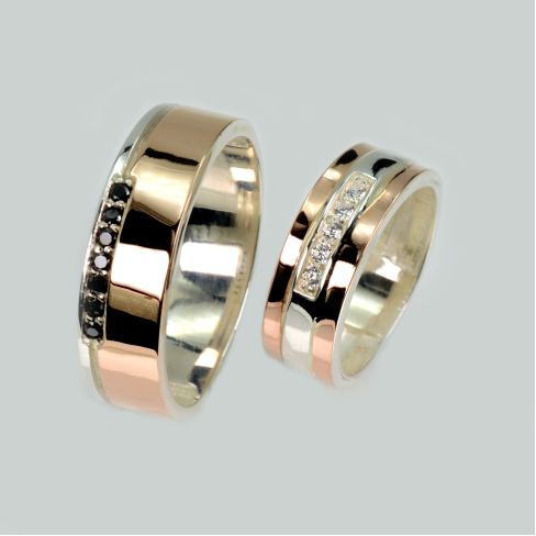 Пара обручальных колец из серебра с золотом
