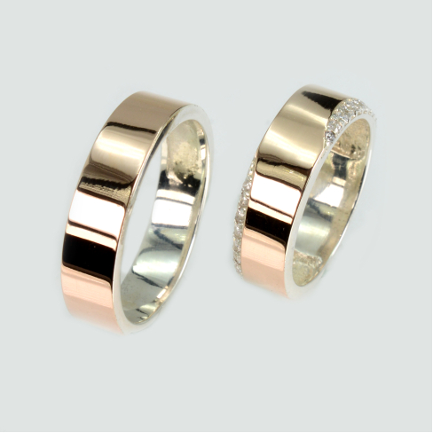 Пара обручальных колец из серебра с золотом