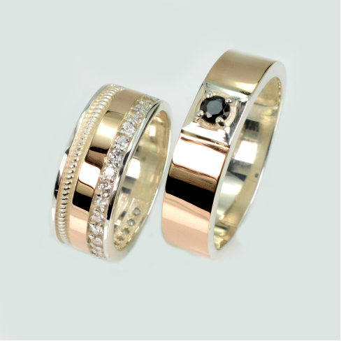 Пара обручальных колец из серебра с золотом