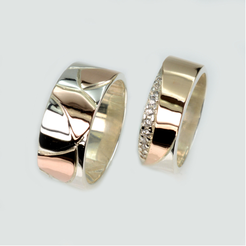 Пара обручальных колец из серебра с золотом