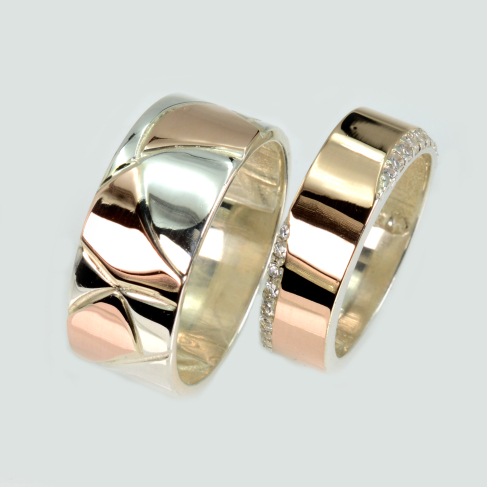 Пара обручальных колец из серебра с золотом