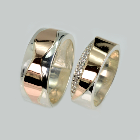 Пара обручальных колец из серебра с золотом