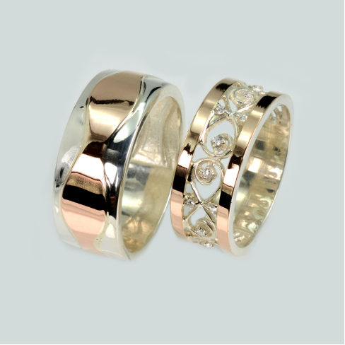 Пара обручальных колец из серебра с золотом