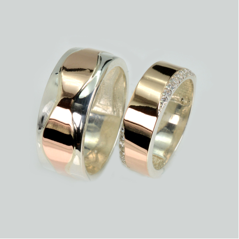 Пара обручальных колец из серебра с золотом