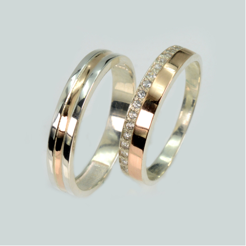 Пара обручальных колец из серебра с золотом
