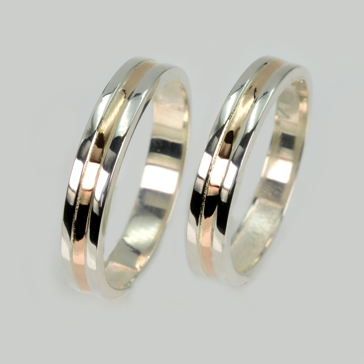 Пара срібних обручок з пластинами золота (Обр39Обр39)