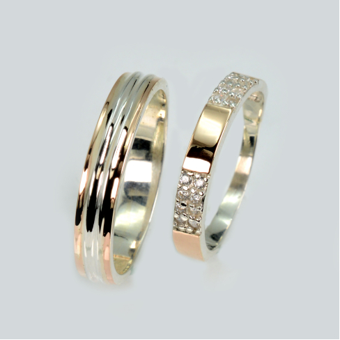 Пара обручальных колец из серебра с золотом