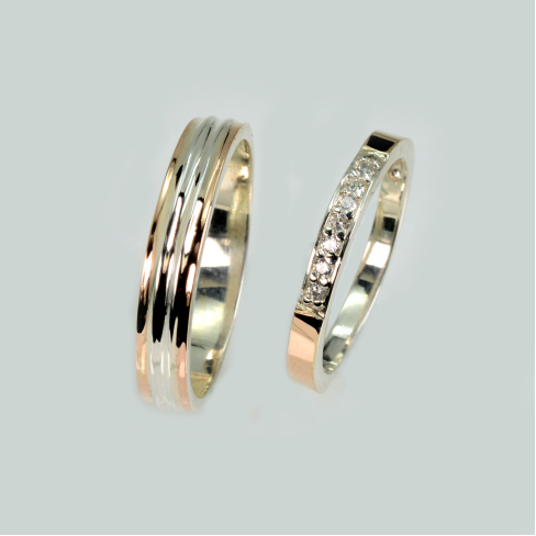 Пара обручальных колец из серебра с золотом