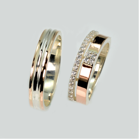 Пара обручальных колец из серебра с золотом