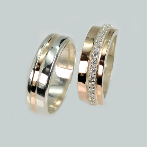 Пара обручальных колец из серебра с золотом