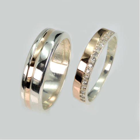 Пара обручальных колец из серебра с золотом