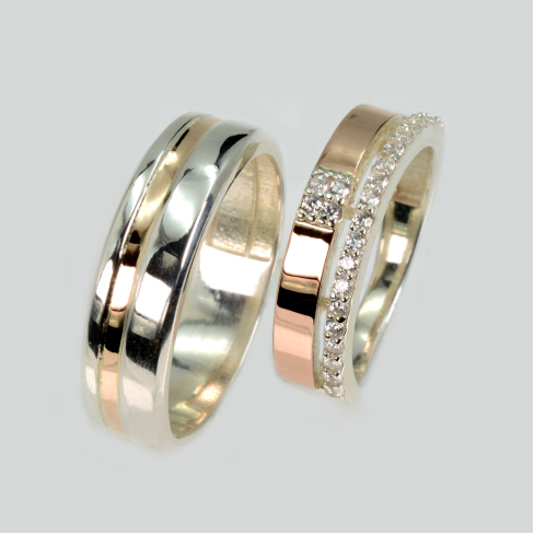 Пара срібних обручок з золотом