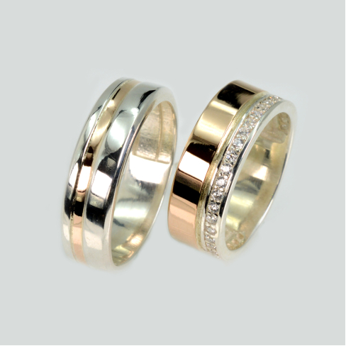 Пара обручальных колец из серебра с золотом
