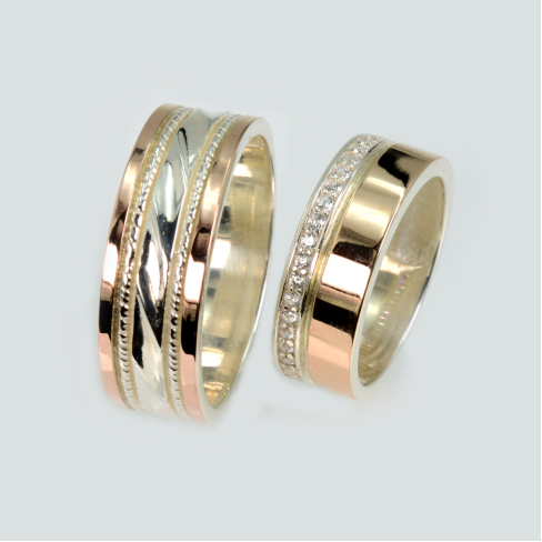 Пара срібних обручок з золотом