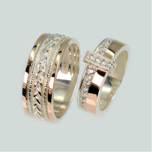 Пара обручальных колец из серебра с золотм