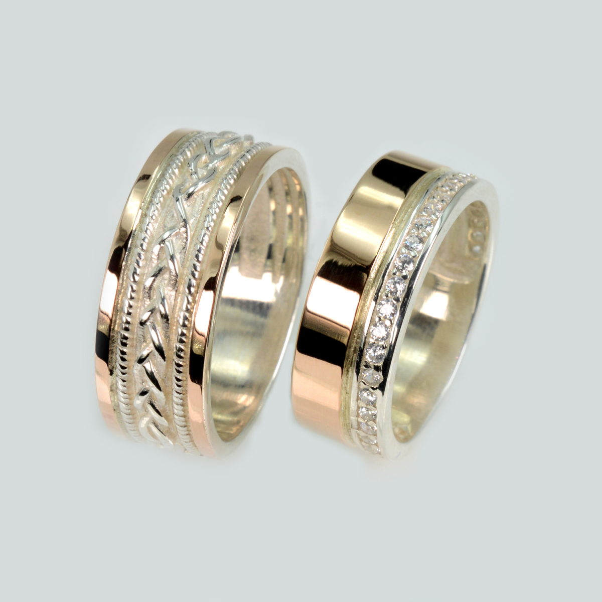 Пара обручальных колец из серебра с золотом (Обр43Обр28)