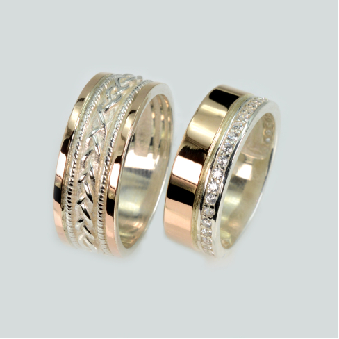 Пара срібних обручок з золотом