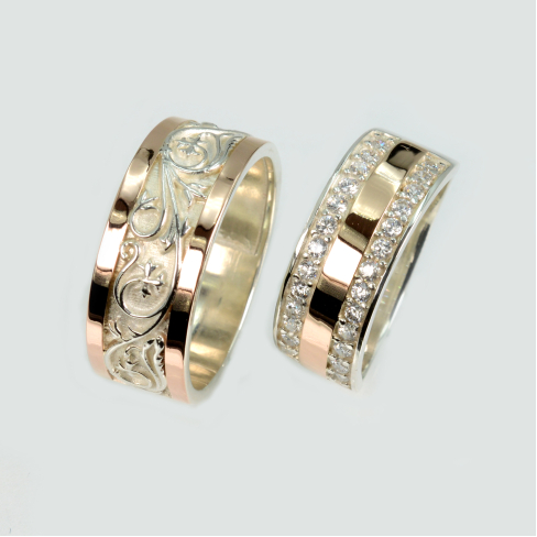 Пара обручальных колец из серебра с золотом