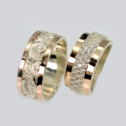 Пара обручальных колец из серебра с золотом