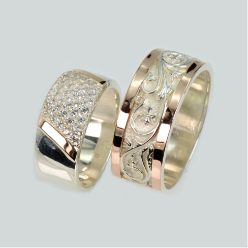 Пара обручальных колец из серебра с золотом