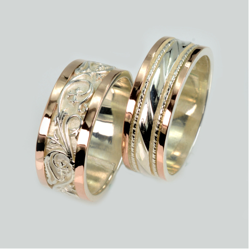 Пара обручальных колец из серебра с золотом