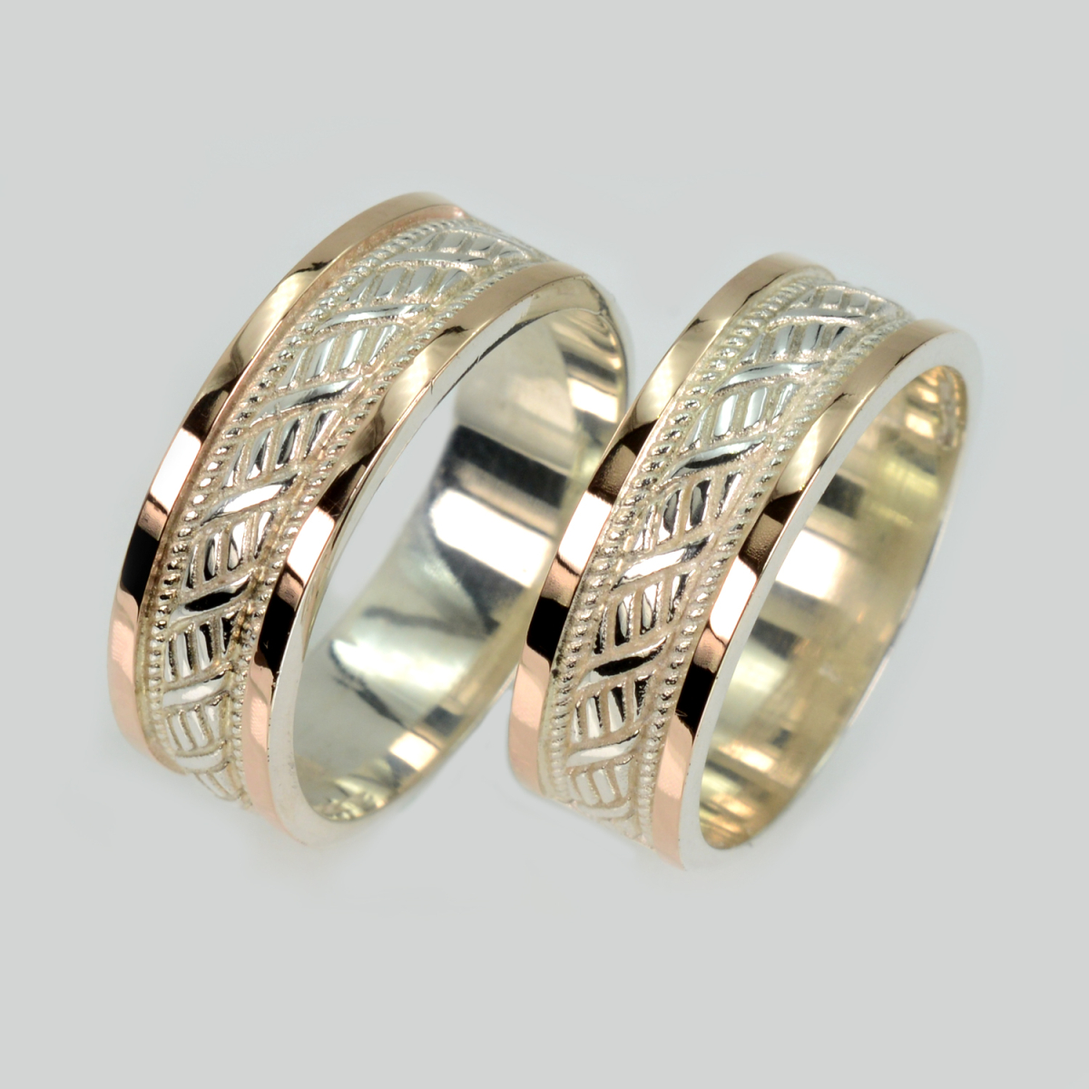 Пара срібних обручок з пластинами золота (Обр49Обр49)