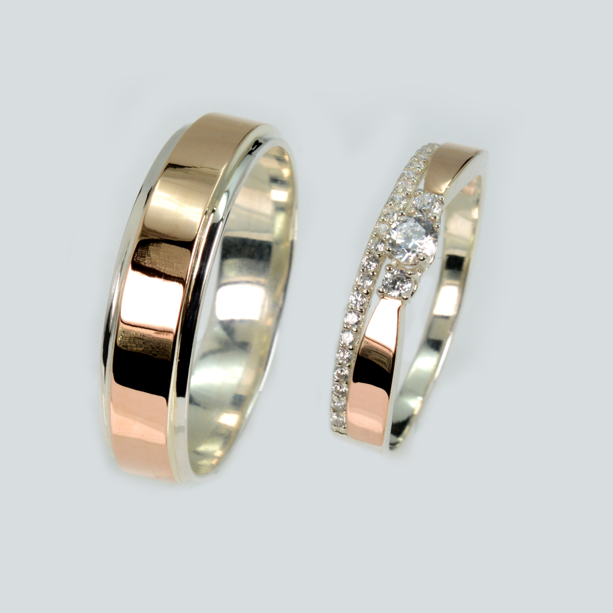 Пара серебряных обручальных колец с золотыми пластинами (Обр5283к)