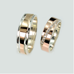 Пара серебряных обручальных колец с золотыми пластинами