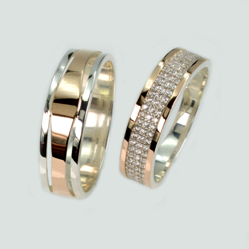 Пара серебряных обручальных колец с золотыми пластинами