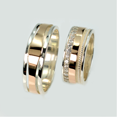 Пара серебряных обручальных колец с золотыми пластинами