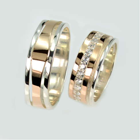 Пара серебряных обручальных колец с золотыми пластинами