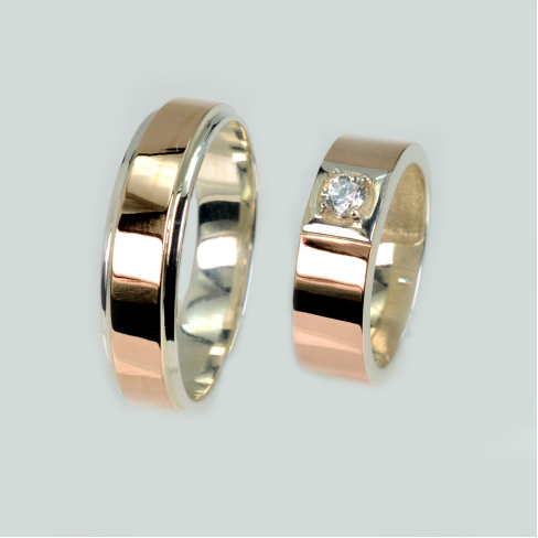 Пара обручальных колец из серебра с золотом