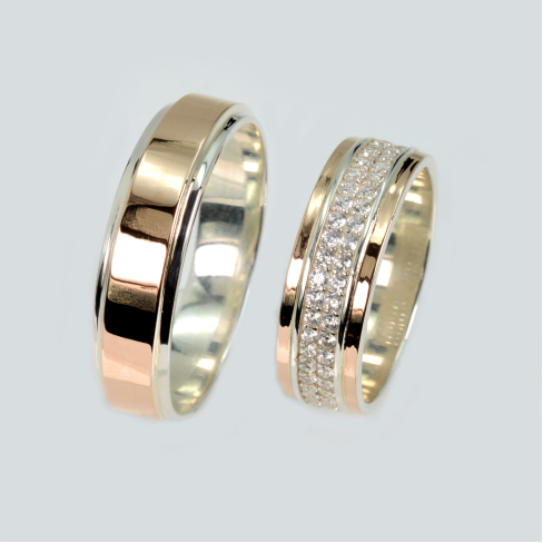 Пара серебряных обручальных колец с золотыми пластинами