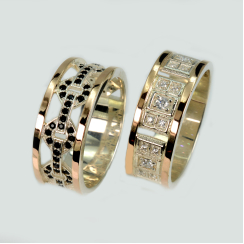 Пара серебряных обручальных колец с золотыми пластинами