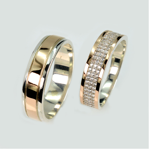 Пара серебряных обручальных колец с золотыми пластинами