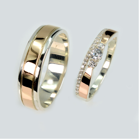 Пара серебряных обручальных колец с золотыми пластинами